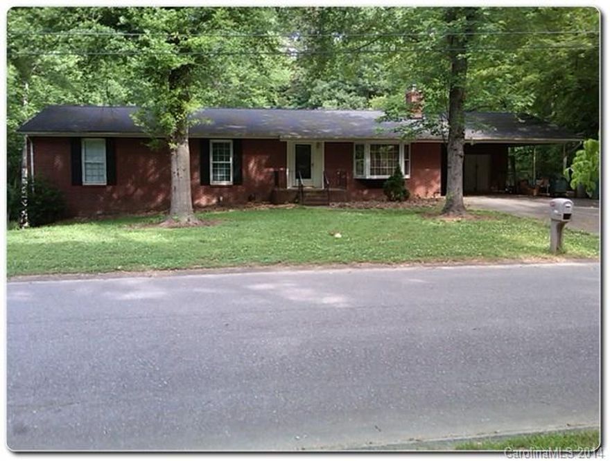 Beautiful one story ranch style full brick home. This home features a basement with a full second living quarters. Cozy living rooms on both main floor and basement featuring a fireplace in each. Two bedrooms are located in the basement and four bedrooms located on the main floor. Large spacious rooms throughout the house. Kitchens have a breakfast area. Large kitchens. Nearly 3/4 an acre of land. Perfect opportunity!