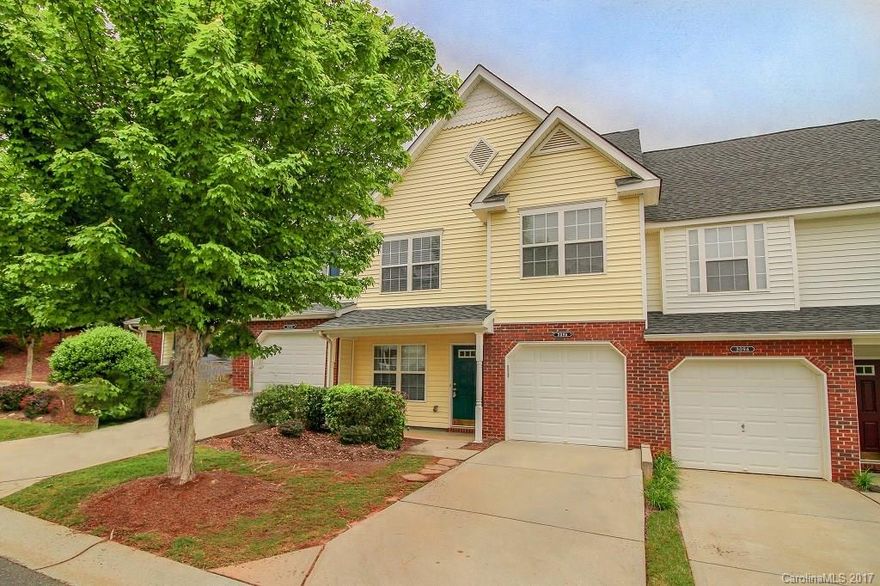 Move right in!  New and improved townhome has been updated with NEW carpet, NEW 12"x 24" ceramic tile kitchen flooring, fresh paint throughout, and some NEW lighting!  Portrait Homes' Cambridge floor plan features a dramatic two story family room, spacious living/dining area, two nice secondary bedrooms,  and oversized master BR with vaulted ceilings.  Rear patio backs to nice vista view of open common area.  Well located complex accessible to convenient lifestyle amenities.