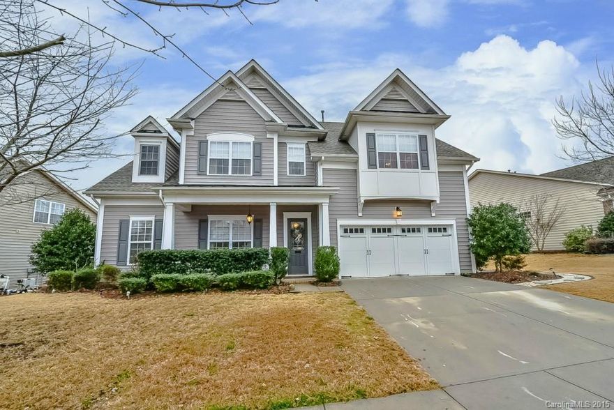 Shows like a model home.  Gourmet kitchen with gorgeous granite counter tops, work island, double oven, breakfast bar. Master on main level with tray ceiling, spacious master bath with double vanity.  Large landing upstairs makes great space for den or office.  Secondary bedroom upstairs has a sitting nook.  Amazing covered back patio area.  Neighborhood amenities.  Great location in Fort Mill with easy access to I-77, airport, shopping and restaurants.  A must see!