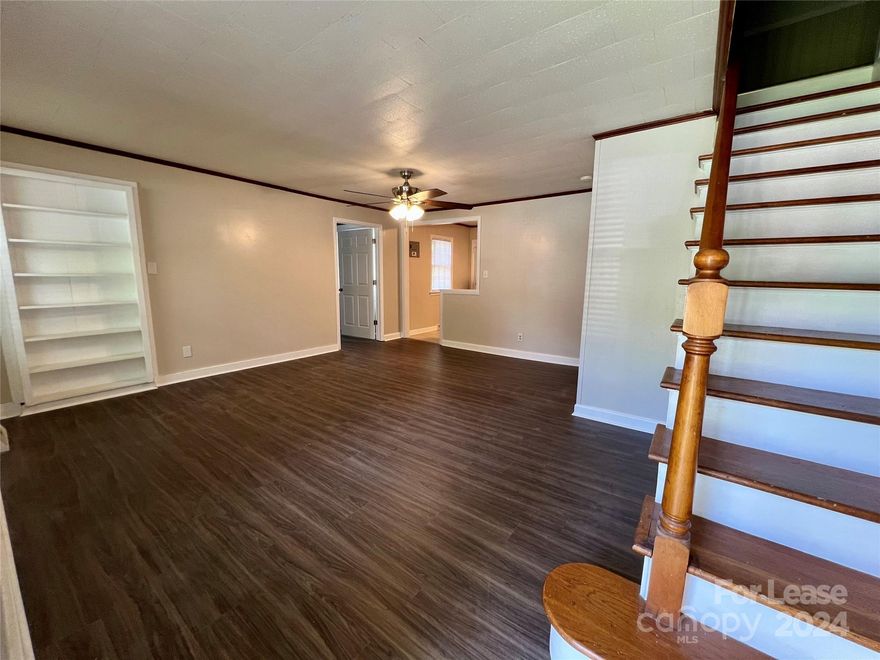 Incredible location on Statesville Blvd near W Innes Street.   With over 15,000 VPD on this part of Statesville Blvd you have a perfect great opportunity for a professional office, service location, administrative office, or specialty retail.   Located next door to other professional offices, there are lots of possibilities with the property zoned CMX which allows all types of retail, office, and service uses.   This previous 4-bedroom 2 bath home that was recently updated and has an open layout in the entrance.  There is a convenient downstairs bathroom that could serve as a public restroom as well as a more private room and bathroom upstairs. This property could easily be used as a Work-Live Opportunity.     There is off-street parking in the rear and even a separate fenced in area within the back yard.   Don't miss this opportunity!!