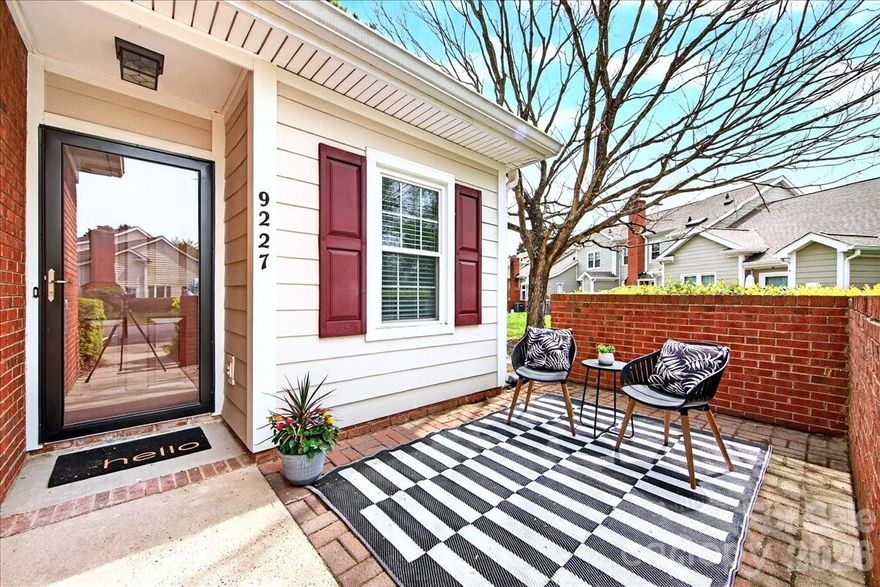 Rare gem in South Charlotte: Newly updated single story END UNIT condo with a private front patio, a rear fenced courtyard overlooking expansive green space, vaulted ceiling, and no upstairs neighbors! This 2-bedroom, 2-bathroom condo has been freshly and tastefully renovated for its new owner. Recent updates include an ALL NEW kitchen (cabinetry, leathered granite countertops, stove, dishwasher, microwave, sink, faucet, disposal), NEW LVP flooring (no carpet!), refreshed bathrooms, new crown molding, light fixtures, washer/dryer, smooth ceilings, fresh paint...and more! The rare and desirable layout offers an open concept main living area featuring a statement brick fireplace, and abundant natural light from the extra windows and vaulted living room ceiling. Both bedrooms are generously sized, and the primary bedroom features an ensuite bathroom and a walk-in closet. Park Walk is a lovely, well-maintained community that offers a pool, tennis courts, close proximity to the Greenway, and convenient access to Southpark and Ballantyne. Welcome home!