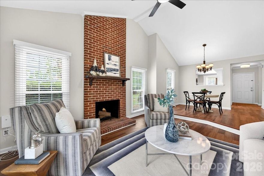 Rare gem in South Charlotte: Newly updated single story END UNIT condo with a private front patio, a rear fenced courtyard overlooking expansive green space, vaulted ceiling, and no upstairs neighbors! This 2-bedroom, 2-bathroom condo has been freshly and tastefully renovated for its new owner. Recent updates include an ALL NEW kitchen (cabinetry, leathered granite countertops, stove, dishwasher, microwave, sink, faucet, disposal), NEW LVP flooring (no carpet!), refreshed bathrooms, new crown molding, light fixtures, washer/dryer, smooth ceilings, fresh paint...and more! The rare and desirable layout offers an open concept main living area featuring a statement brick fireplace, and abundant natural light from the extra windows and vaulted living room ceiling. Both bedrooms are generously sized, and the primary bedroom features an ensuite bathroom and a walk-in closet. Park Walk is a lovely, well-maintained community that offers a pool, tennis courts, close proximity to the Greenway, and convenient access to Southpark and Ballantyne. Welcome home!