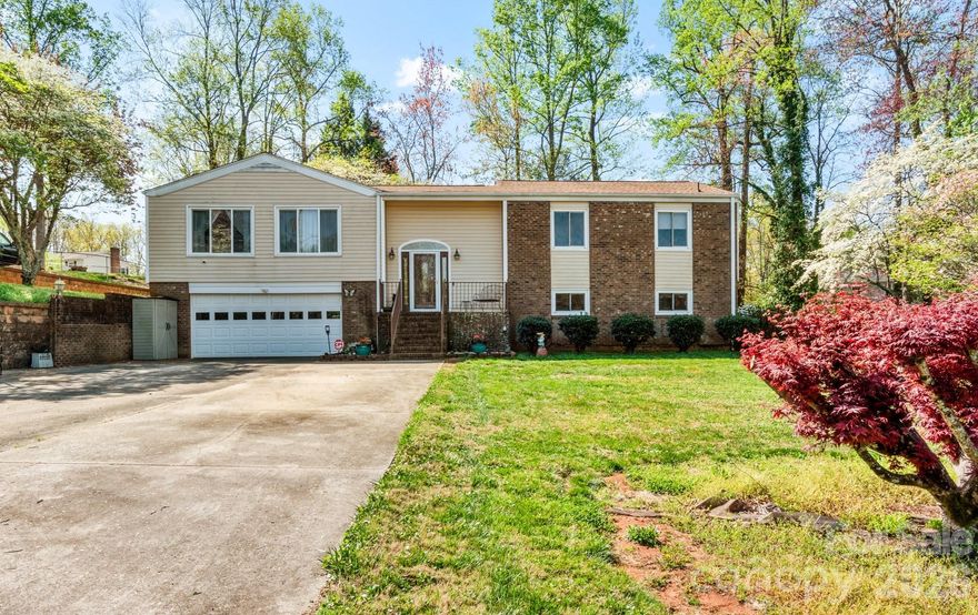 This beautifully maintained 4-bed, 3-bath split foyer home situated on a generous 0.85 ± acre lot in Kernersville is definitely worth a look. The main level features a bright living & dining area, a functional kitchen, & three bedrooms, including the primary suite. You’ll also find a lovely sunroom which leads out to the screened porch & back deck, creating an ideal setup for indoor-outdoor entertaining. The lower level adds incredible versatility to the home, featuring a cozy den and bathroom anchored by a classic fireplace. This level also includes a private fourth bedroom, a dedicated laundry room, & convenient access to the spacious 2-car garage. Modern updates include a new roof installed in 2023 & a water heater in 2022. The home is also equipped with a central vacuum system, a security system, & thoughtful drainage solutions like French drains & a garage sump pump. Conveniently located near shopping, dining & all Kernersville has to offer!