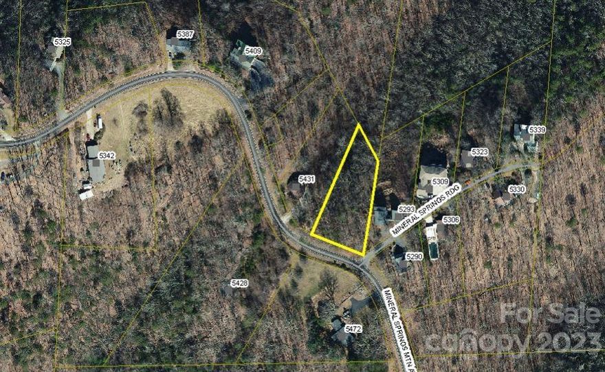 Build your new home on this beautiful mountain lot with privacy and a great neighborhood serviced by schools that are high performing too.
