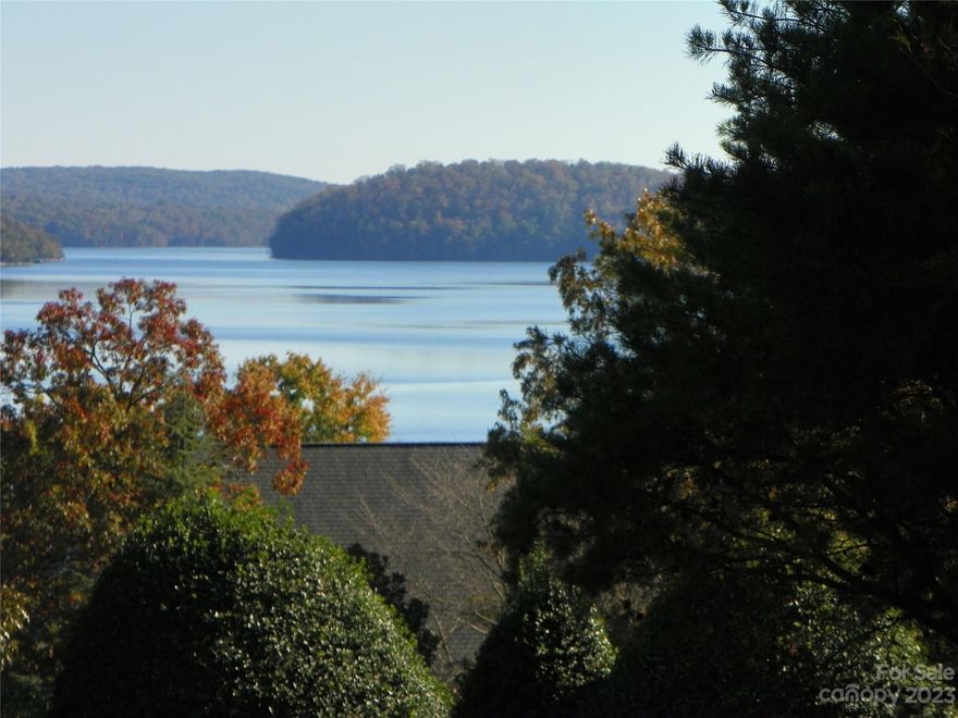 Lot 145 Badin View Dr. located in the beautiful gated waterfront community of Heron Bay on Badin Lake.  This slightly elevated peninsula consists of two beautiful lots see location on map.  May be purchased separately or together.  ( Lot 145-$129,000  Lot 146-$139,00  TOGETHER- $259,000)  The trees on the property have been limbed up enhancing  the beauty of the lay of the land and gives a better idea of house placement and view of beautiful Badin Lake.  Enjoy the serenity , peacefulness and camaraderie  of this lovely community. Meet new friends and neighbors at the community functions, also reserve the great Clubhouse for personal get togethers! Boat launch beside the Clubhouse, Boat Storage for a small fee, walking trails for your enjoyment, beautiful lantern lit street lights, all underground utilities.  Well and septic needed for lots.  ONLY 1 hr. drive to major airports-Charlotte and Greensboro. For your enjoyment-Uwharrie National Forest is just minuets away!