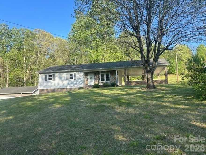 3 Bedrooms and 2 full baths ranch style home on 1.81 acres per survey. You'll find new cabinets in the bathrooms, new plumbing fixtures, etc.  The floors are primarily hardwoods and are in great shape!  The majority of the windows are double pane vinyl, and the basement is set up in such a way that it will be easy to convert it to heated sq footage.  The home has a remarkable amount of storage for vehicles and/or equipment.  There is an attached double car garage, an additional double car garage/workshop and lastly a single car garage with an apartment overhead.  If you're looking for a home with land, tons of storage and in close proximity to Morganton, Lenoir or Hickory this may be what you are looking for!  Call today! Ask your agent about any noted material facts.