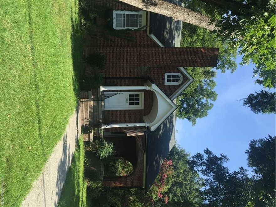 Beautiful brick 2 story house with 5 bedrooms (4 upstairs, Master suite down), 3 full baths, kitchen, living room and there is a bonus room (with closet) that could be used as an office or another bedroom.  There is a basement.  The home was remodeled in 2006.  It has hardwoods in the living room, dining room and bonus room.