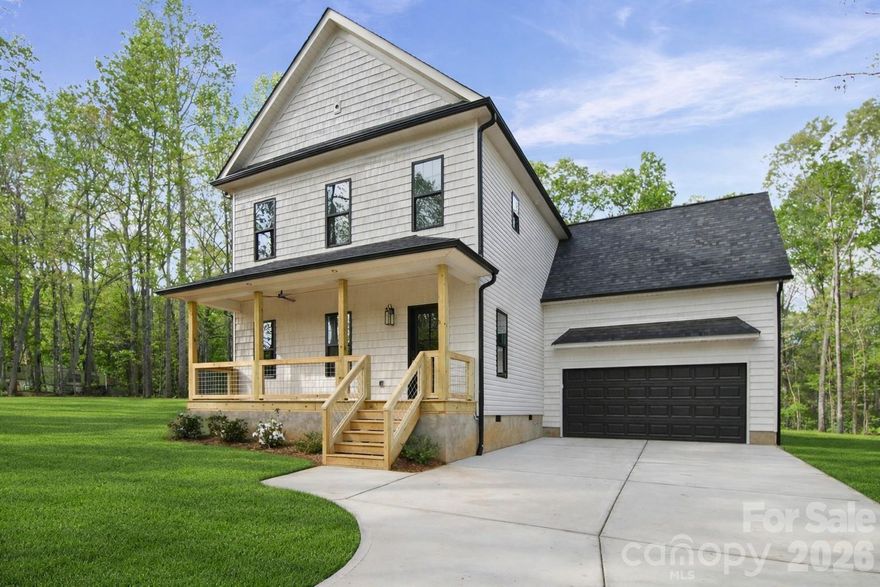 This new-construction home is nestled on 1.72 acres in Gaston County, with a Lincolnton address.  Featuring a charming farmhouse look, this spacious property offers four comfortable bedrooms and modern touches throughout. Perfectly blending rustic elegance with contemporary design, the home provides a warm, inviting atmosphere.Laundry room on both levels. Enjoy plenty of space for outdoor activities in this peaceful countryside setting—an ideal retreat for those seeking a beautiful, new-built home with a timeless farmhouse aesthetic. **Buyer is responsible for installing the propane tank for the gas logs**