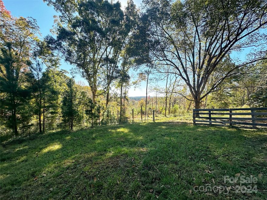 Beautiful 12.57 acreage in rural Montgomery County. Partially open/partially wooded. There is some fencing on the property for animals and a few outdoor buildings. There is also a structure on the property which appears to be uninhabitable.