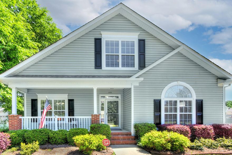 **Have you seen Pineville, NC lately??  If not, you are missing a treat! This home is a quick walk to the vibrant & growing downtown area w/ great restaurants, places to grab a coffee or beer plus much more. Community park hosts dog park, great playground, splash pad & summer concerts/movies in the park. Home has a fabulous floorplan w/ wood floors throughout main level. Open plan w/ large kitchen (ample cabinet/counter space) w/ granite (all appliances convey). Formal & casual dining areas. GRoom is open to kit w/ gas fireplace as a focal spot. Primary bdrm & secondary bdrm on main level.  Upper level has two add'l bedrooms & loft. Fresh paint & new carpet throughout. Detached garage is accessible via covered patio. Covered area behind garage can be used as a carport or gathering area with stone wood burning fireplace. Small grassed area keeps the time spent on yardwork at a minimum. Quick closing.