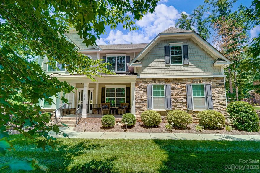 Gorgeous custom-built home in sought after community The Bluffs. Exquisite architectural details throughout: arched doorways, rich crown molding, coffered ceilings & beautiful flooring. The open floor plan is great for entertaining & includes, formal dining, living room/office, large great room with fireplace, guest suite & two laundry rooms with main floor being used for storage. Engage your inner chef in the gourmet kitchen with ss appliances, gas cooktop, double ovens, breakfast bar, and dining area. Upper level of this dream home boasts 3 secondary bedrooms, 2nd laundry rm, massive bonus/rec room, and luxurious primary suite with tray ceiling, huge walk-in closet & spa-like bath. Large screened porch is perfect for entertaining or to relax & take in the natural setting. Spacious private wooded backyard with common area behind. Nice custom 10x16 storage building. Great Lake Wylie location, minutes from the lake, dining, & shopping. Clover schools, and low SC taxes!