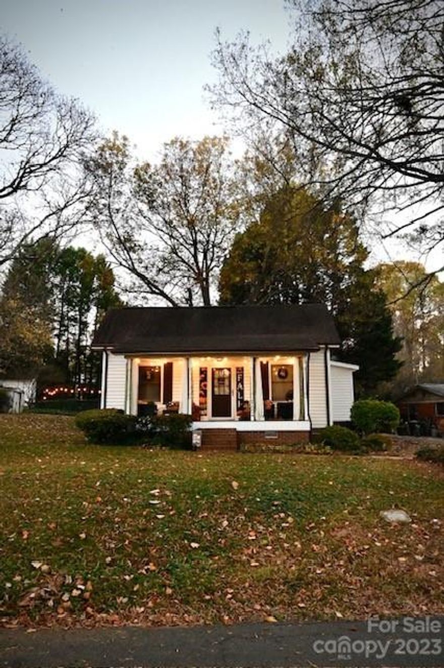 Location, location, location! This charming Cornelius home is located right around the corner from downtown on a quiet, peaceful street! Relax on your cozy front porch with beautiful mature trees and park views or enjoy a night by the fire pit in the private backyard with family and friends. This 3 bedroom home has a great open layout perfect for first time home buyers, a small family or potential investor looking for rental income. And the location is simply unbeatable! This almost half acre lot overlooks Legion Park, a true neighborhood park with picnic area, playground, walking trail and recreation area. Conveniently located near Davidson and all Cornelius has to offer including restaurants, shopping, pubs, the new Arts Center, schools, grocery and interstate for easy commute. Don't miss out on this hidden gem!