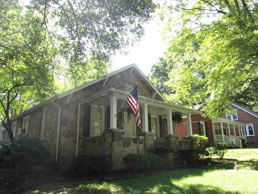 Once upon a time there was the perfect little house in the perfect location....That time is now!  Cute as a button, this story book bungalow is very well maintained, located within walking distance of downtown Hickory, and is  close to schools, medical facilities, recreation, parks, shopping and more. Low maintenance rock exterior. Preserved to the max with picture molding in the living room, dining room, study/office and bedrooms. Hardwood floors throughout. The rocking chair covered front porch offers a great place for relaxing. Plenty of room for parking and includes a detached garage. Perfect starter home or for anyone wanting to downsize. Let this be your home and live happily ever after!