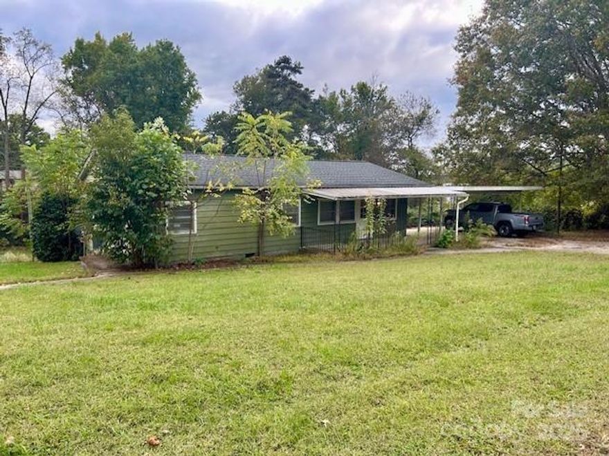 Prime location in Granite Falls!  Located on Falls Ave this tract consists of almost 4 acres of land, with a frame barn and a home.  The land is mostly cleared and at least particularly fenced!  The home appears to originally be a single wide mobile home that was later added unto. There is approximately 701 heated sq ft that is heated and an additional 514 (original mobile home) that is slightly under 7' (under the guidelines for the NC Real Estate Commission heated sq ft must be at least 7'). In the older section (with ceilings under 7') the full bathroom, laundry, kitchen and office area are located. Again, this cannot be included in the "heated sq ft criteria".  This will be a "cash only" purchase. Sold "AS IS".  The land and location are gorgeous, offering lots of opportunities for additional usage. Please contact Greg Wilson at Granite Falls planning for details.  It appears the property may be used in some capacity as a farm or divided into tracts (single family or duplex usage).