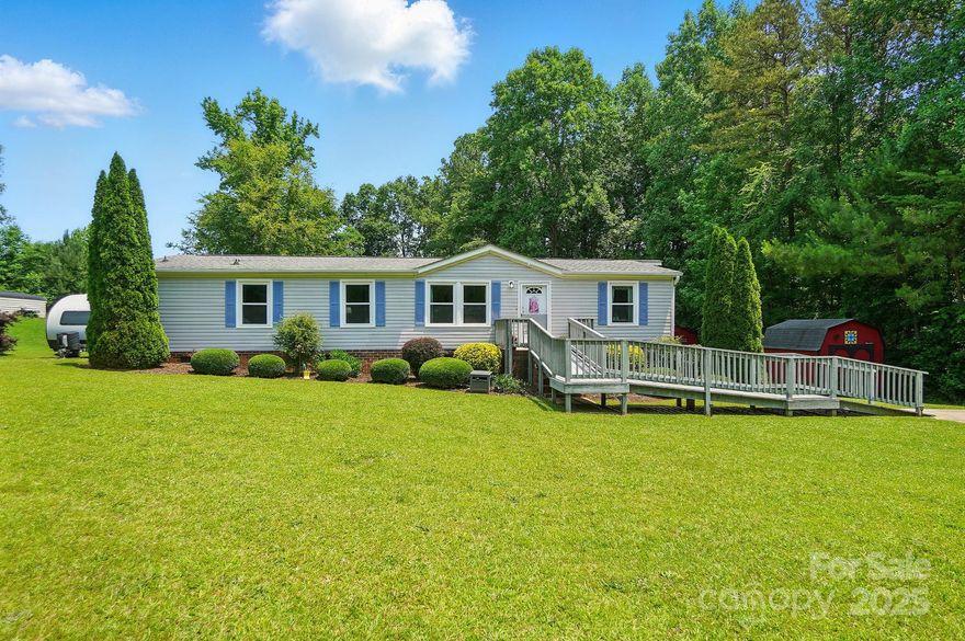 Immaculate & move-in ready 3 bed, 2 bath home in sought-after Valley View Estates on a pristine 1-acre lot! Enjoy summer days in the above-ground pool w/ custom decking, plus 2 large wired sheds (one with A/C unit) perfect for storage or a workshop. Park your RV or camper on either side—both w/ 30 amp, one w/ full water/sewer hookup! Interior boasts luxury vinyl plank floors, a bright living room, spacious family room, and eat-in dining. The kitchen shines with freshly painted cabinets, abundant storage & counter space. **Crawlspace sealed/ encapsulated with dehumidifier installed.** Lush perennial gardens add charm & curb appeal. Prime location near shopping, dining, highways, airport, Uptown & Lake Wylie!