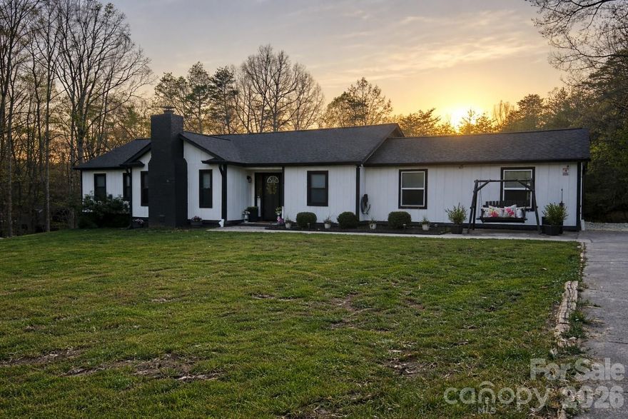 Welcome home to space, upgrades, and privacy — all on 1.94 acres in desirable Harrisburg, NC.

From the moment you arrive, you’ll appreciate the setting — positioned on a spacious lot surrounded by mature trees, offering both room to roam and peaceful views.

Inside, the vaulted living room features rich flooring, abundant natural light, and a striking brick fireplace as the focal point. The open layout flows into the beautifully freshly painted kitchen (2026), creating a bright, refreshed feel showcasing granite countertops, custom cabinetry, stainless appliances, and bar seating — ideal for everyday living and entertaining.

The dining space connects seamlessly to the main living areas, creating a warm, inviting layout.

The primary suite offers a true retreat, complete with a spa-style bathroom (finished in 2026) featuring a freestanding soaking tub and designer finishes. A custom walk-in closet provides exceptional storage and organization.

Major upgrades provide long-term peace of mind:
• Dual Zone HVAC with heat pack updated in 2021
• Halo REME air purifier installed in 2022
• Water softener & filtration system installed in 2021 
• Propane tankless water heater installed in 2022
• Septic tank replaced with larger tank & inspected in 2024
• Most plumbing upgraded to PEX 
• Exterior painted in Aug 2024
• Carpet replaced in 2025
• French drain installed in 2025


Outdoor living is where this property truly shines. The expansive deck replaced in 2022 includes multiple entertaining areas, and views of the above-ground pool and custom pool deck (2022). A playground area and trampoline will convey with right offer and adds even more functionality to the backyard space.

And the bonus feature buyers will love — a large detached shop with multiple garage bays, ideal for car enthusiasts, hobbyists, storage, or workshop space.

With nearly 2 acres, a detached shop, updated systems, and incredible outdoor entertaining space — this Harrisburg property offers flexibility, functionality, and lifestyle all in one.

Schedule your private showing today.