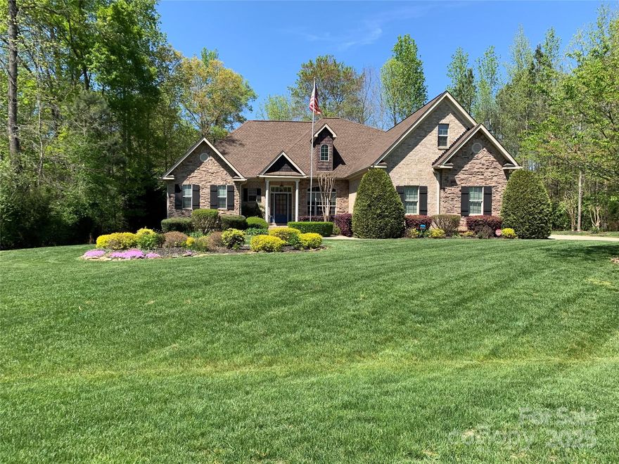 Gorgeous home in the beautiful neighborhood of The Coves!  This much-loved home features 3 bedrooms on the main level (including the primary suite).  Upstairs features a huge over-sized bonus room with wet bar, a large bedroom with walk-in closet, and a full bath.  There is also a walk-in attic for additional storage.  Property is almost an acre and is completely fenced and pet friendly.  Sip your morning coffee on the screened in porch that overlooks the large yard - which definitely has plenty of room for a pool.   Wow!! - Yes - a 4 Car Garage (2 car attached and 2 car detached) with epoxy floor and utility sink in the attached garage.  Located within a short distance to 3 different grocery stores, retail shopping and several restaurants and within the Award-Winning Clover School District! Also - Home also features a 220 hookup both outside and inside on the detached garage!