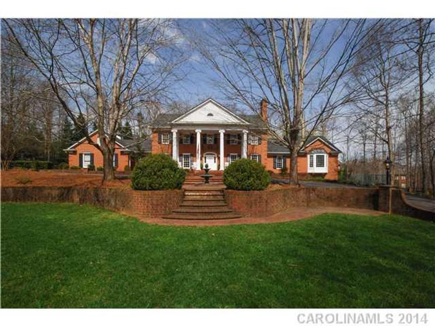 A magnificent Georgian estate on over 8 acres within the city of Matthews. The charm and elegance of a historical property with all the amenities of today. Beautiful pool, hot tub, and outdoor kitchen for resort style living and entertaining. Circular drive, fountains, gas lanterns, multi-car garage, tennis courts. Top rated sought after schools. Antique Pine flr's. One of a kind.
