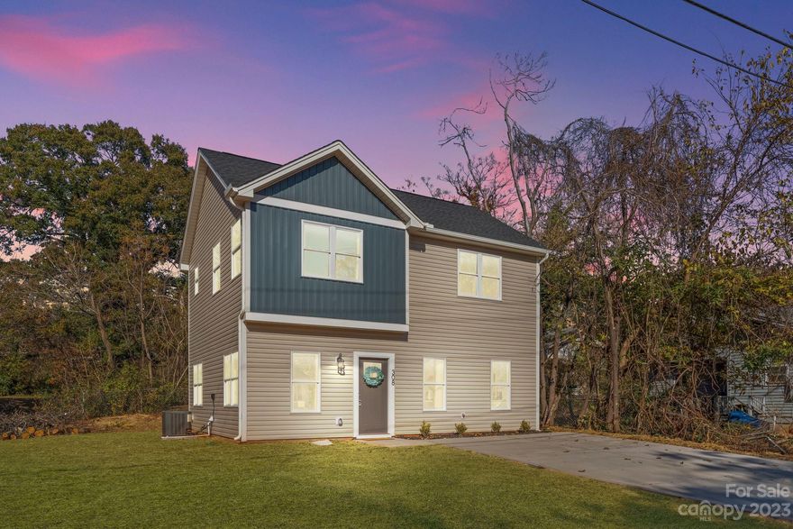 Discover the allure of new construction in the heart of Statesville, NC, at 308 Winston Avenue. This two story gem boasts a contemporary style and thoughtful design, promising modern comfort for its lucky residents. As you arrive, the gable roof and charming design set the stage for what's inside.  The bedroom on the main floor is the first of 4 bedrooms in this home, which could be a great office space. The large driveway adds a practical touch to your everyday convenience. The heart of this home lies in its expansive kitchen, featuring ample white cabinetry, a convenient breakfast island, and a sunny breakfast nook—a perfect place to start your day. With modern bathrooms and bedrooms featuring plush carpeting, this residence offers a serene escape. Don't miss your chance to make 308 Winston Avenue your own. Schedule a viewing today to experience modern comfort and convenience in a fantastic location.