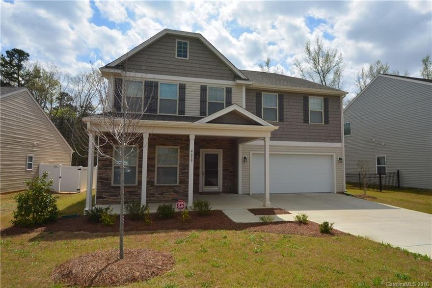 An amazing home! Upgraded at every corner. From heavy molding throughout to hardwood floors, stainless appliances, granite countertops and upgraded cabinetry in the kitchen... From the mud room area off of the garage to the full bedroom with a bath en suite on the main level; great closet spaces; an oversized rec room at the top of the stairs... This house has it all.  All appliances remain including large stainless refrigerator as well as washer & dryer. 4 bedrooms, 3 1/2 baths