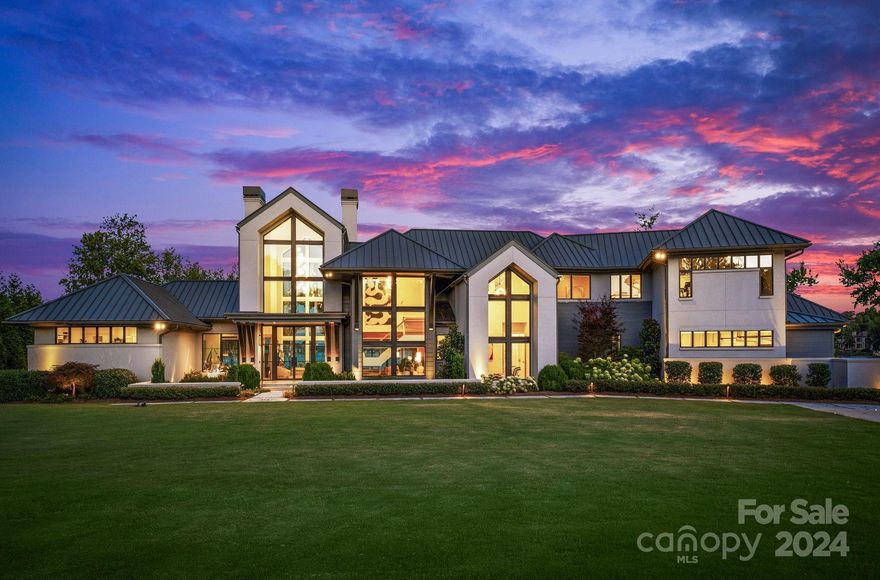 This Luxury Waterfront Estate is truly a RARE FIND! Every detail of this 2020 custom built home was masterfully planned and artfully executed.  The Impeccable design choices and custom finishes are evident from the moment you step through the front door.
