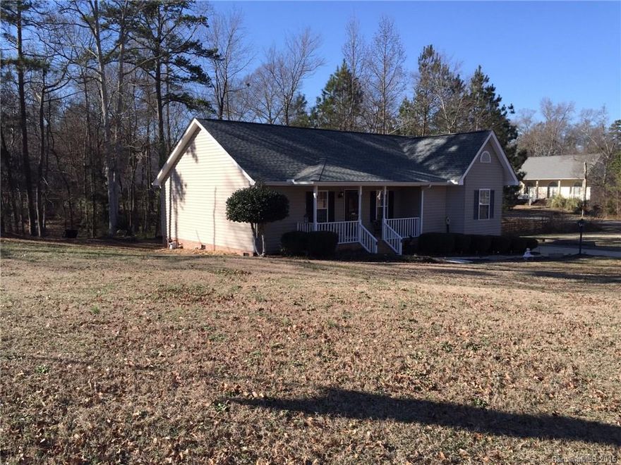 Great house located on private corner lot with wooded back yard! 1 ACRE! House has been very well kept and double deck added on back! New A/C unit recently installed! A MUST SEE! Gorgeous Views from back Double Deck! New Updates Throughout including Flooring!