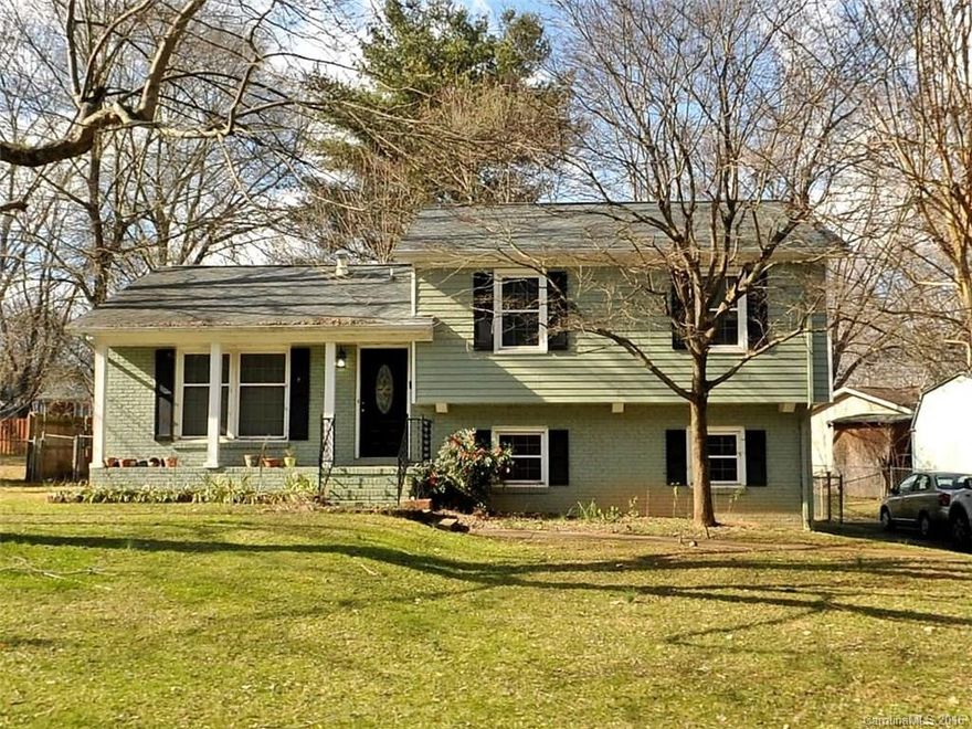 You have not seen one like this before.  Walk in to a unique, very open floorplan, all bamboo flooring on the main level & no interior walls breaking up the space.  Wood counters, farm sink, built in bookcases, lower level features a frpl, engineered wood flooring, more built ins & a bar with built in cabinets.  Updated main bath with new tile, large bedrooms & HW floors on the upper level.  Fantastic large wired shop in the fenced yard, covered patio. Close to light rail, Southpark, No HOA