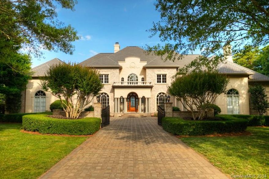 Panoramic views from almost every room.Two story great room, master bedroom with access to lakeside terrace-library & private study, gourmet kitchen opens to living room & lakeside breakfast area. 2nd master bedroom upstairs with private terrace.Basement level features open media area, billiards, bar, exercise room, steam shower, recreation room, bedroom, & study.Lakeside pool  w/entertaining area