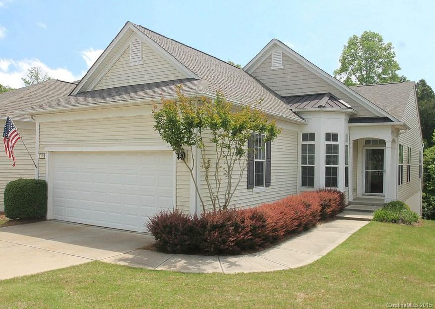 Gray Myst w/ Superior Wall System Finished Basement, Sunroom, Deck, & Wooded View! Incredible Location in 55+ Community —Walking Distance to The Lakehouse & Golf Clubhouse.Spacious Great Room w/ Formal Dining Area. Kitchen w/ Stainless Appliances, Built in Desk, Hardwoods, & Nook. Sunroom leads to Trex Deck w/ Retractable Awning & Wooded View. Owner’s BD & Private BA w/ Dual Sinks, Shower, & Walk-In Closet. Finished Basement w/ Great Room, Guest Suite, & Storage. Covered Patio w/ Wooded View.