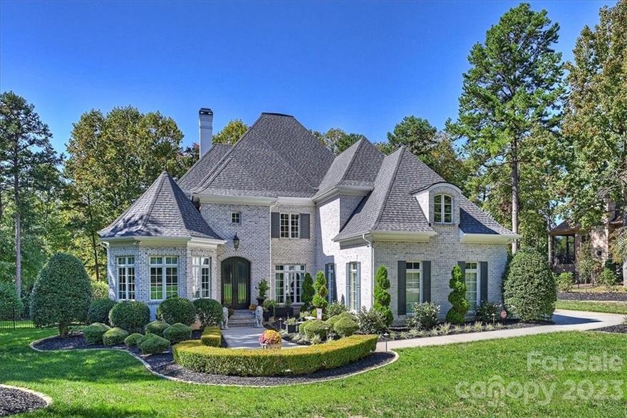 This Point gem has been beautifully remodeled with no expense spared. All brick (factory glazed) home is the picture of elegance located on the 2nd fairway of TNGCC. The 2 story foyer inpresses w/the lovely staircase w/beautifully crafted woodwork details & stunning light fixture. The kitchen, now open to the great room, is a masterpiece w/new reclaimed brick floors, all new custom cabinetry with Cambria Quartz countertops, all new appliances that include Wolf double ovens & gas cooktop, SubZero refrigerator & wine tower & Viking ice maker. Covered patio w/new flagstone built in grilling station, new fire pit on lower patio. Private office just 2 steps up from the foyer, updated primary suite w/new California closet system & fully remodeled bath w/Italian marble & limestone on floors & walls. 2 updated laundry rooms. Boat Slip Pier Z#12 Included. Over $100,000 in outdoor improvments including landscaping, hardscaping & new fence. Please see attachments for all updates.