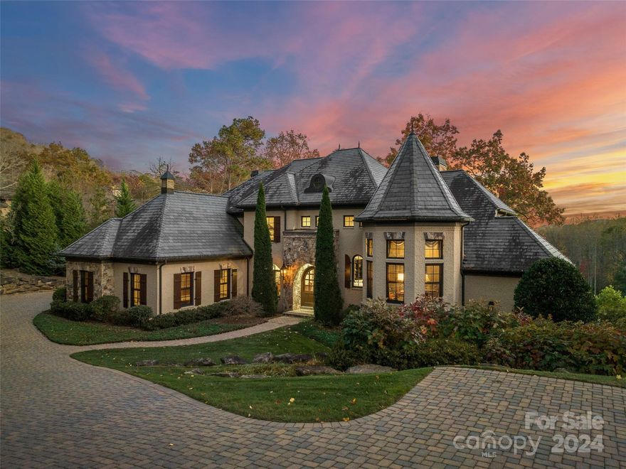 This estate home sits on the signature golf hole at The Cliffs of Walnut Cove. Immediately feel the old-world charm when you walk in the front door of this truly exceptional mountain home. Meticulous attention to detail is evident in every corner of this residence. The gourmet kitchen is a work of art, making it perfect for hosting gatherings. A one-of-a-kind oval dining room adorned with stacked stone walls adds a unique touch to your dining experience. The primary suite is a haven of comfort, featuring a cozy sitting area and a fireplace. Your personal study is designed with a raised entrance from the stairway landing to give the space a special "hide away feel”. As you unwind at the end of the day, you'll be treated to breathtaking sunsets while gazing over the 12th fairway of the prestigious Jack Nicklaus Signature Golf Course. Mountain views coupled with a perfect location make this spacious mountain home a perfect match for someone who wants the best of all worlds!