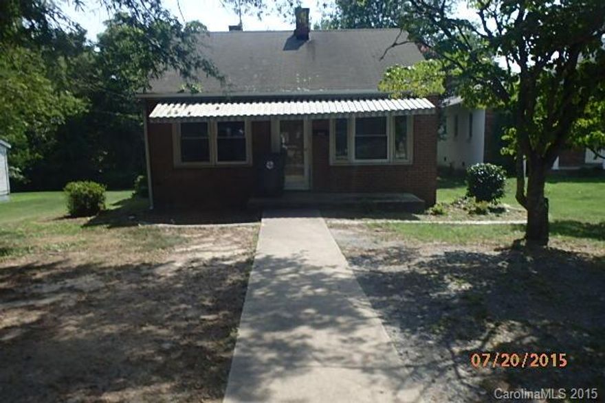 Adorable brick ranch. Walk to town center. Church on one side. Large backyard. Clover schools. Great investment property. Newer kitchen and baths. High crawl space under the house for extra storage. Great price.