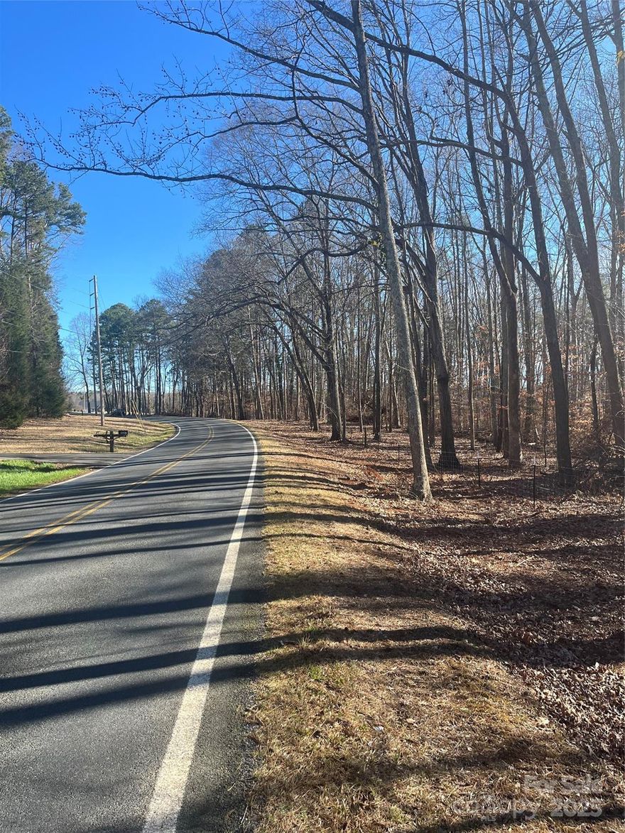 Rare opportunity to own +/- 15 acres just outside of Davidson on beautiful Archer Road! Primarily covered in hardwoods with multiple near-perfect building sites. Also, recently fenced for cattle with new posts and wire. Properties like this aren’t available very often.