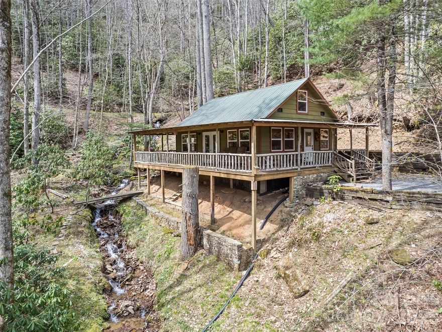 Tucked inside a quiet gated community. this rustic cabin offers a peaceful retreat surrounded by the sights and sounds of nature. This 2 bedroom 1 bath home is for those seeking a refreshing connection to nature, a dedicated cold plunge area right off your back porch in your own little creek. Hiking trails around the area offer a chance to reconnect and slow down. This cabin is more than just a place to stay-it's a place to rejuvenate, breathe deeply ,and enjoy the simple beauty of the outdoors.