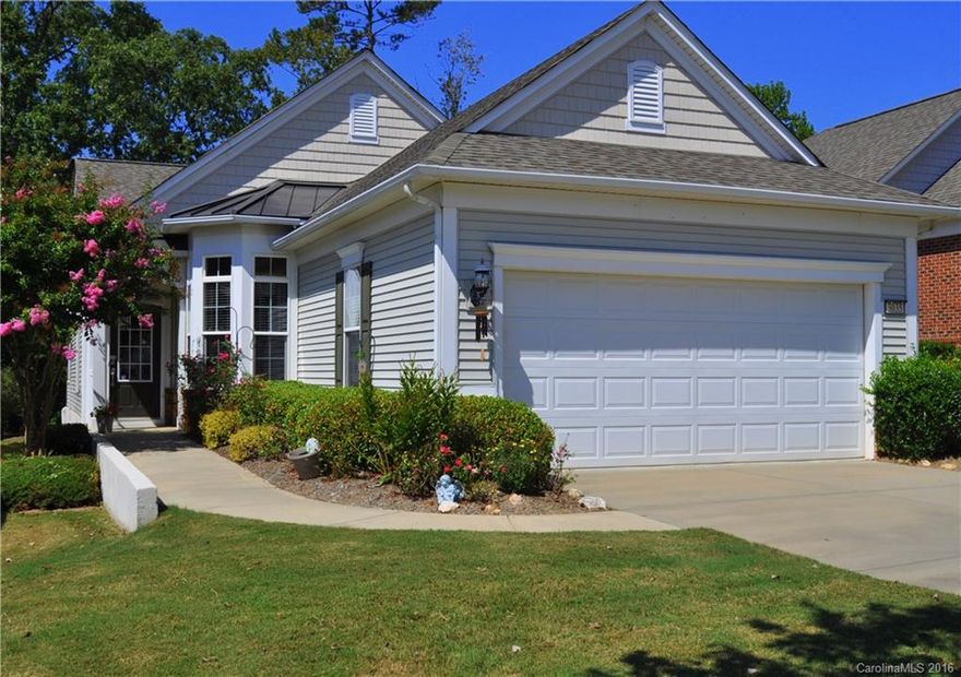 FRESHLY painted all interior and BRAND NEW carpet! Move in ready,well maintained charming Gray Myst on premium wooded PRIVATE cul-de-sac lot!!Open floorplan with abundant light! Newer hardwood floors, newer roof,home pressure washed,windows and screens cleaned,& trim freshly painted.Features a SUNROOM for relaxing that can be used as screened porch!,3 bedrooms or 3rd bedroom study option. Large walk in closets & tiled baths.Large kitchen w/ SS app and built in desk!Walking distance to shopping!