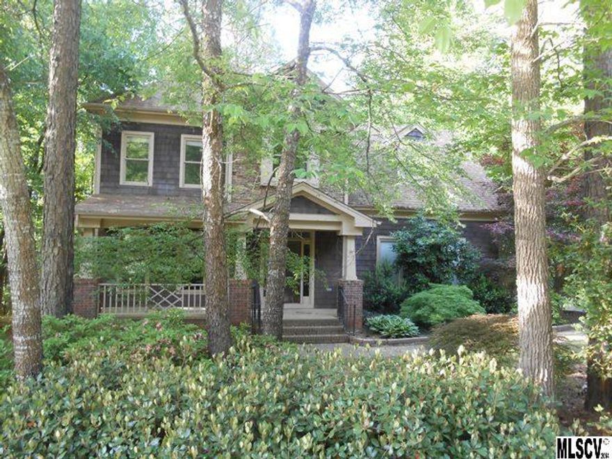 Mooresville cedar shake and stone home with over 2300 Sq Ft of Living Area. Open floor plan with wood burning fireplace in great room. Kitchen w/granite counters, tile backsplash, and stainless steel appliances. Hardwoods on the main floor, upstairs hall, and owner's suite. Large deck that overlooks private backyard. Irrigation system included. Comes with Deeded Boatslip #143.  Great Neighborhood!