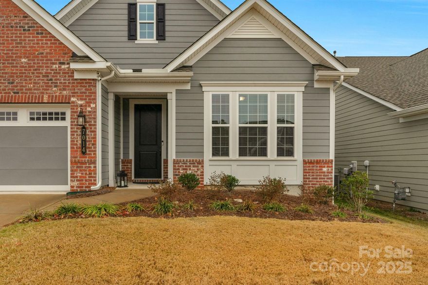 Stunning 3 bed/2 bath ranch home w/ tons of upgrades & designer features is ready for new owners!  Buyers will love resort style living in Charlotte's 55+ Cresswind community w/ amenities galore! This Laurel Model features a  gourmet kitchen w/ stainless appliances, granite counters, & abundant storage! The great room features a cozy gas fireplace, 11 foot ceiling and is pre-wired for a home theatre. The spacious primary suite has a coffered ceiling, walk in closet and spa like bath with garden tub, tiled shower with glass surround & dual vanity with marble countertop! A large secondary bedroom and bedroom/home office share another full bath! Hardwood flooring throughout w/ tile in the bathrooms, upgraded 7-1/4 " baseboards & 5" crown molding are just some of the special features you will see! Community amenities include an indoor & outdoor pool, hot tub, clubhouse, cabana, fitness center, dog park, game courts & so much more. This home checks all the boxes!