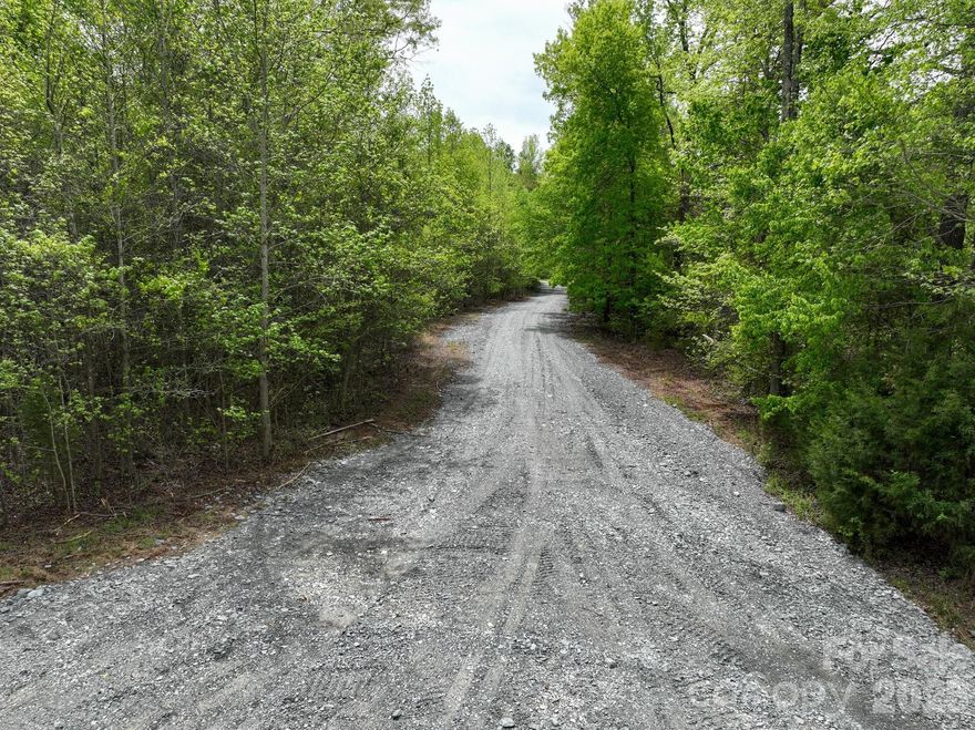 Experience true freedom and privacy on this beautiful 10-acre parcel tucked away in a quiet, secluded setting. With no restrictions, the possibilities are wide open—build your dream home, establish a private equestrian estate, create a peaceful weekend retreat, or hold as a smart long-term investment.

The land is mostly wooded, offering a natural canopy of shade, scenic beauty, and the perfect backdrop for a homesite. With selective clearing, you can design your ideal layout—whether that’s pasture for horses, winding trails, or a private homestead surrounded by nature. A gentle stream runs along the back of the property, adding to the serene setting and attracting local wildlife.

Enjoy low county-only taxes and the kind of privacy that’s getting harder to find, all while being conveniently located between Concord and Salisbury with just a 5-minute drive to I-85.

If you’ve been searching for unrestricted land where you can truly create your own lifestyle, this 10-acre tract offers the space, flexibility, and peaceful surroundings to make it happen.