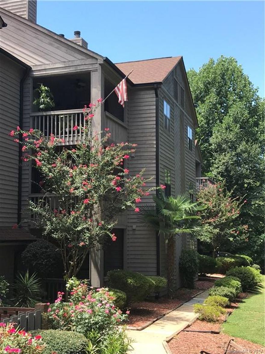 Enjoy seasonal views of Lake Wylie from this Lovely Move-In ready,  2 Bedroom, 2 Bath condo in Lake Front Community. This condo is perfect with a Split bedroom floor plan,  Granite Counter tops, Fireplace, New Carpet and New Paint. Enjoy nature from the covered Balcony or take a dip in the Community Pool that is right around the corner!  Lake access from community docks and so much more!
