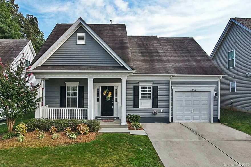 Jewel of a home only 3 miles from Ballantyne!  1.5 story home with large Master Bedroom Downstairs and spacious bedrooms upstairs separated by loft space overlooking the 1.5 story great room.  Recently updated flooring makes this home move in ready!  Features gas fireplace in living room, tons of natural light, covered outdoor patio and fenced yard.  Community pool, fitness center and a club house.