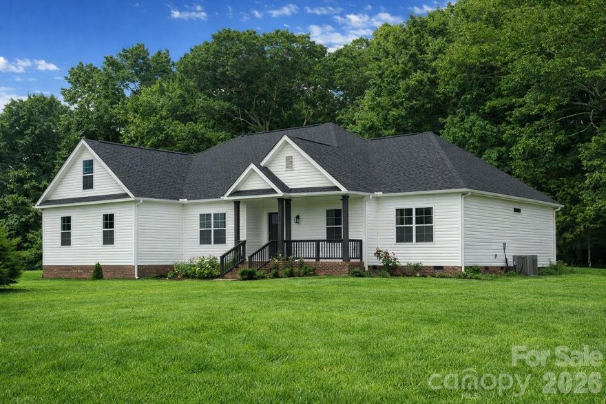 Modern ranch 4-bed, 2.5-bath ranch on 10.2 acres, accessed via a 0.8-mile private-shared gravel road. Features open-concept living, large windows, LVP flooring, black shiplap fireplace, quartz gourmet kitchen with walk-in pantry, and custom mudroom. Bonus room upstairs and flex room for office. Outside: fig-trees, fruit trees, chicken coop, and a fenced run. A peaceful blend of style, space, and country living.