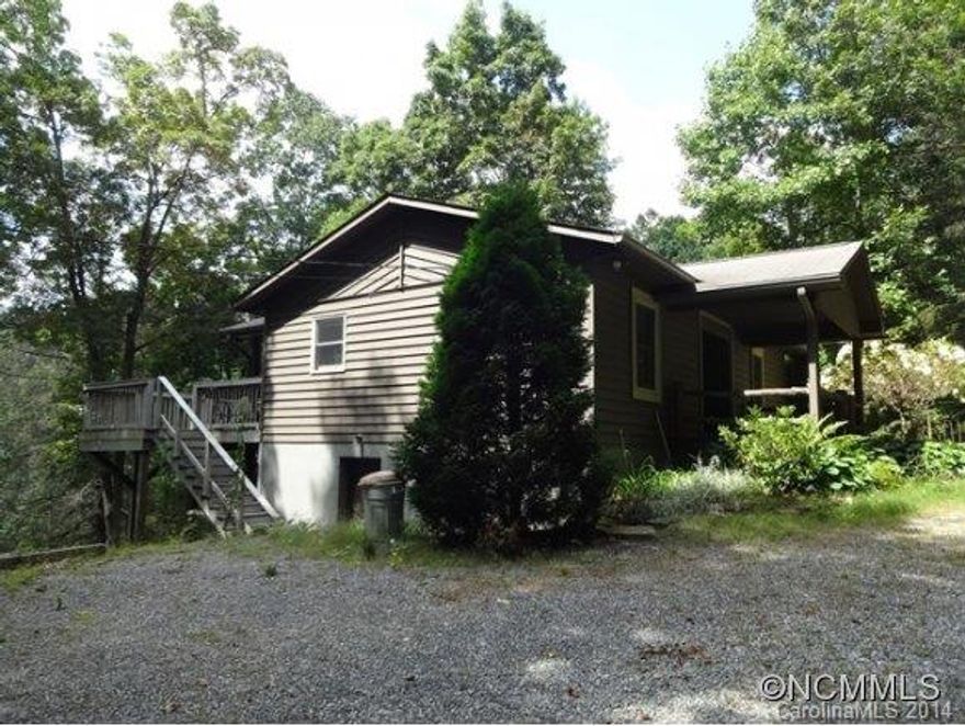 Charming cottage, perfect for someone who wants to live in the mountains! Includes full, finished basement with bedroom/bath and large unfinished deck. Has wood flooring, updated kitchen, huge deck with nice views and would make a great seasonal or year round home. Easy access off paved street in quiet Highlands neighborhood. Highlands Schools