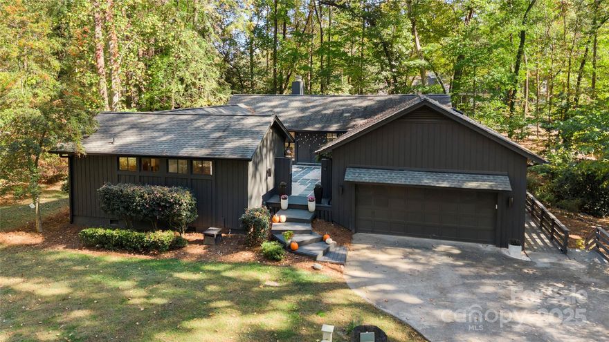 Welcome home to this beautifully updated 4-bedroom, 3.5-bath home with a 2-car garage in the desirable River Hills community. Enter through the peaceful, zen-inspired private courtyard into a light-filled living room featuring vaulted ceilings, a wall of windows, and a cozy wood-burning fireplace. The open-concept layout flows seamlessly into the kitchen, perfect for entertaining with a large island, breakfast nook, KitchenAid appliances, quartzite countertops, walk-in pantry/mudroom, and a convenient wet bar. Step from the kitchen or living area onto the screened porch and back deck to enjoy the surrounding nature and fenced backyard (.53 acre lot). The main level includes the primary suite with ensuite bath, laundry, and two additional bedrooms with a shared Jack-and-Jill bathroom. The finished walk-out basement offers abundant natural light, a full bath, bedroom, and second living area ideal for guests, an office, or playroom. The walk in crawl space offers a workshop area w/ electrical & lighting. 11 new windows are scheduled to be installed soon on the main level. River Hills offers resort-style amenities, including 24/7 guarded gate access, a neighborhood beach park, optional country club membership, playground, dog park, walking trails, and marina access. Agent is owner. 3D Zillow Tour Available.