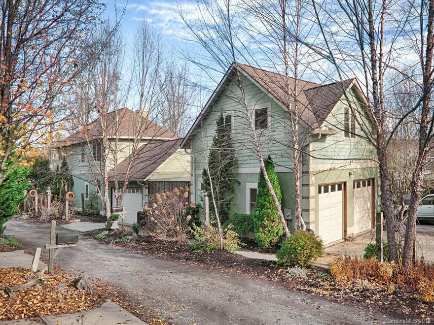 Rare investment opportunity to own stunning three story 2,112 sqft family home w/in-law suite+kitchen AND a detached two story 954 sqft guest house (each floor w/full bath/kitchens) PLUS an adjacent vacant residential lot. Polished hardwoods/ fireplace(s), views, exceptional nooks & private outdoor spaces. Walk to vibrant DT West Asheville & New Belgium, yet live on a delightful quiet street.