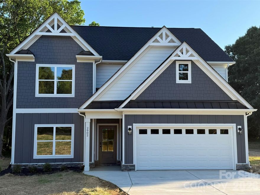 Welcome to this beautifully designed two-story home offering 2,330 square feet of comfortable and functional living space in an established neighborhood with no HOA. The main level features a versatile flex space with an adjoining full bathroom, perfect for an in-law suite, guest space, or private home office.

The spacious kitchen includes a bright breakfast area and flows seamlessly into the impressive two-story living room, creating an open and inviting atmosphere ideal for both everyday living and entertaining. A balcony overlook and grand two-story foyer add architectural interest and an elevated feel throughout the home.

Granite countertops are featured throughout, providing a cohesive and upscale finish. Situated on a large corner lot, there is ample outdoor space for relaxing, entertaining, or future possibilities.

Enjoy the charm of country living while still being just minutes from town offering convenient access to shopping, dining, and everyday essentials.