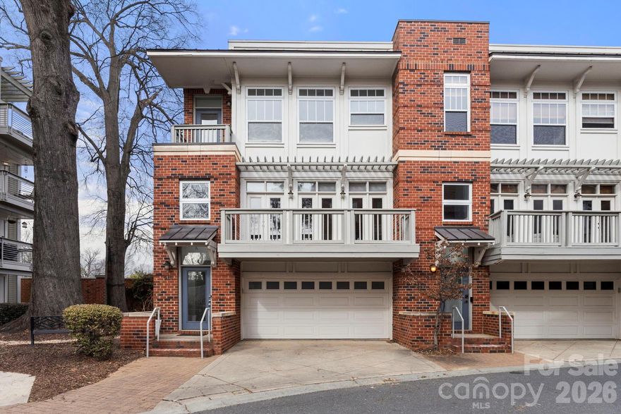 Stunning modern entry leads to a light-filled open floorplan designed for both everyday living and elevated entertaining. This beautifully appointed 3-bedroom, 2.5-bath condo blends thoughtful design with stylish finishes throughout — plus fresh interior paint, brand-new carpet in the bedrooms, and a new front deck for a truly move-in-ready experience.

The kitchen features granite countertops, tons of cabinetry, split-face tiled backsplash, stainless steel appliances, and a wet bar area. Modern light fixtures, a built-in sound system, multiple balconies, a unique city view, and abundant natural light elevate the entire living experience.

Upstairs, the primary suite offers a spacious retreat complete with a walk-in closet and private bath. Two additional bedrooms provide flexibility for guests, office space, or whatever suits your lifestyle — all enhanced with new carpet for added comfort.

The must-see oversized garage impresses with exceptional space and versatility — ideal for storage, a home gym setup, workshop area, or maybe a tailgate-prep zone.

Enjoy the unbeatable Elizabeth location — just moments from dining, shopping, and entertainment — walking distance to Independence Park and the Lynx Gold Line, plus quick access to Uptown, Plaza Midwood, and nearby hospitals. Convenience and connectivity truly set this home apart.

This exceptional end unit delivers style, space, and accessibility in one of Charlotte’s most vibrant areas.