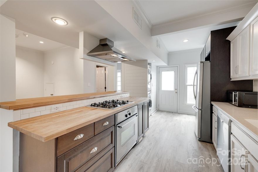 Renovated two story condo is minutes from South Park and entertainment, shopping, and highway access. You'll love the modern amenities of this home like open floor plan downstairs, butcher board countertop, built-in closets, barn doors, and luxury vinyl plank upstairs. Outdoor space is fenced and an exterior storage closet is included. Investors are welcome to this community but no short term rentals are allowed.