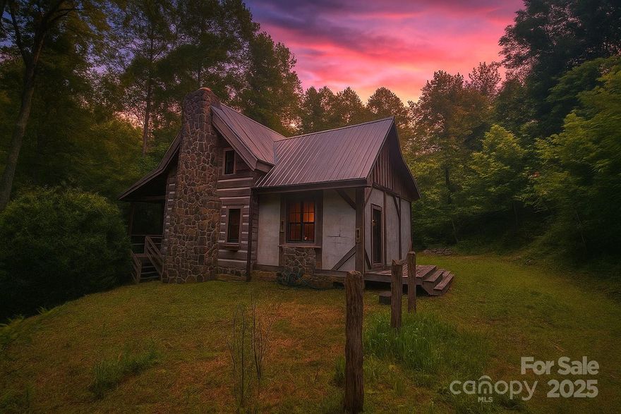 Tucked into +/- 56 acres of Appalachian beauty, this off-grid hemlock log cabin is your rustic dream come true. Energy-efficient and self-sustaining, it features a stone fireplace, walnut floors, granite counters, propane cookstove, kitchen woodstove, and on-demand hot water. A main-floor bedroom and bath offer comfort, while a cozy loft welcomes guests. Gravity-fed spring water, septic, and generator-ready power keep life simple. With streams, springs, garden space, and a fenced poultry coop, it's ideal for a homestead or retreat. Borders 246 acres of US Forest Service land for private hiking/hunting. Perfect for a family compound, off grid getaway or a hunters paradise. 20 Minutes to Downtown Marion and minutes to Altapass Orchard, Blue Ridge Parkway, Asheville, Boone & more. Come claim your slice of Appalachian heaven! O