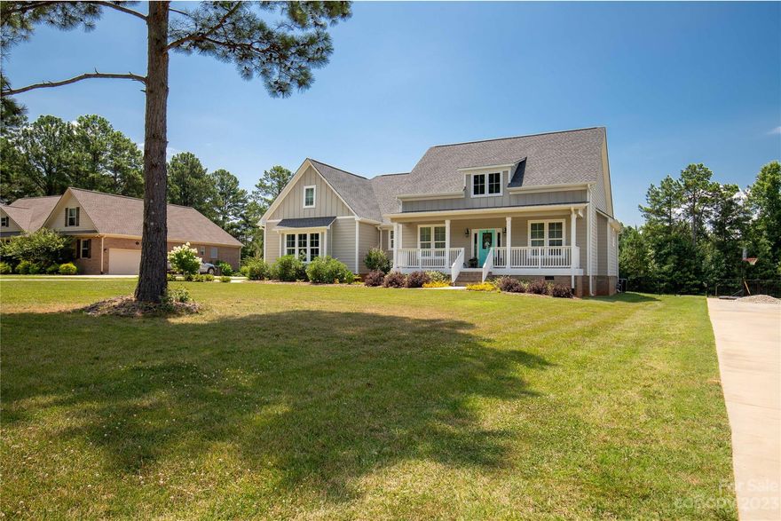 A stunning, impeccably maintained home built just five years ago.  The open floor plan creates an inviting atmosphere with an abundance of natural light.  The blend of beauty and functional space in this kitchen will have you ready to create that next meal.  Island with seating plus a separate dining area!  Enjoy the luxury of a spacious primary bedroom, featuring a serene spa-like en-suite and generously sized walk-in closet.  Upstairs, a sizable bonus room allows for versatile space - could be for entertainment, hobbies or home office!  Whether it's on the covered front porch surrounded by manicured landscaping or covered back deck overlooking a fenced in back yard, you'll find cozy comforts with shade!  Perfectly poised on just over a 3/4 acre lot, overlooking the 15th green of the Golf Course!  We will see you soon at 1327 Springlake Road!