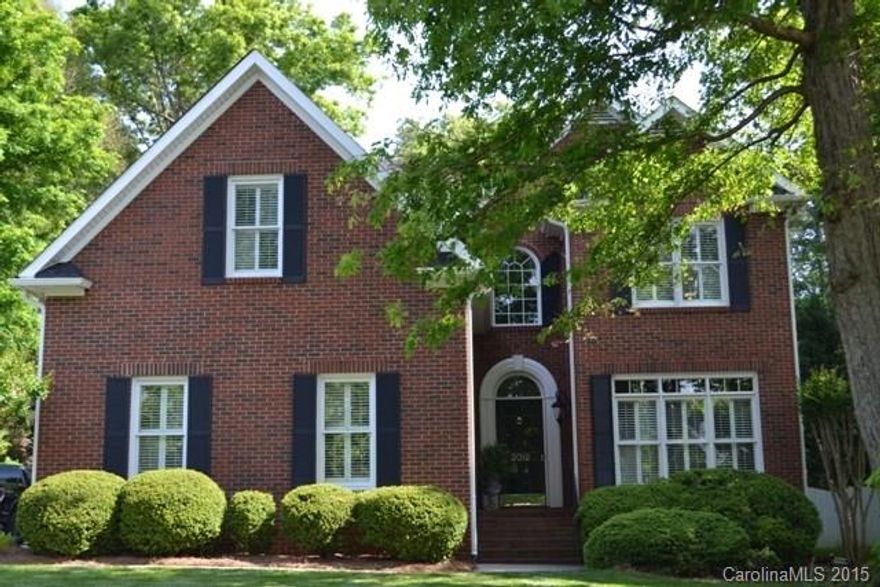 Unbelievable deal! Gorgeous 4 BR/ 3BA full brick home in Wedgewood features formal dining,2 storry great room w/ built in entertainment center and fireplace. Beautiful kitchen with stainless steel appliances and granite counter tops, huge bonus room w/ endless possibilities. Master on main w/ hardwoods, tray ceiling, and bath w/ huge walk-in closet. Huge screened porch,wonderful patio, fenced yard and peaceful wooded views! Don't miss this rare opportunity!